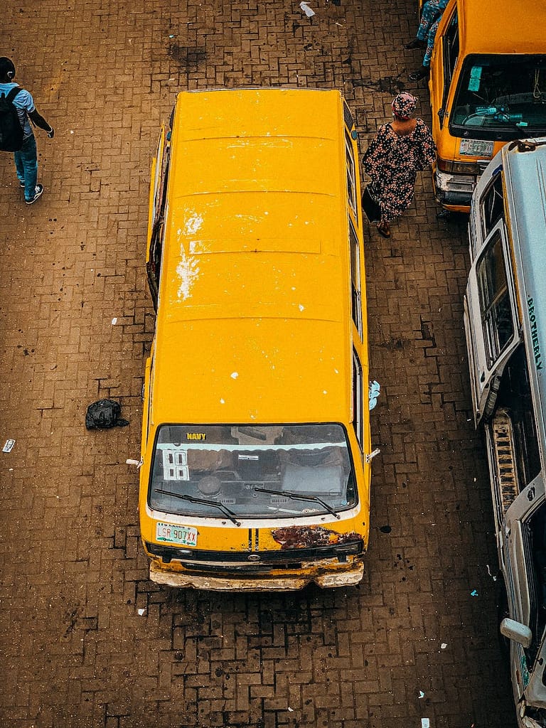 yellow van on brown brick road