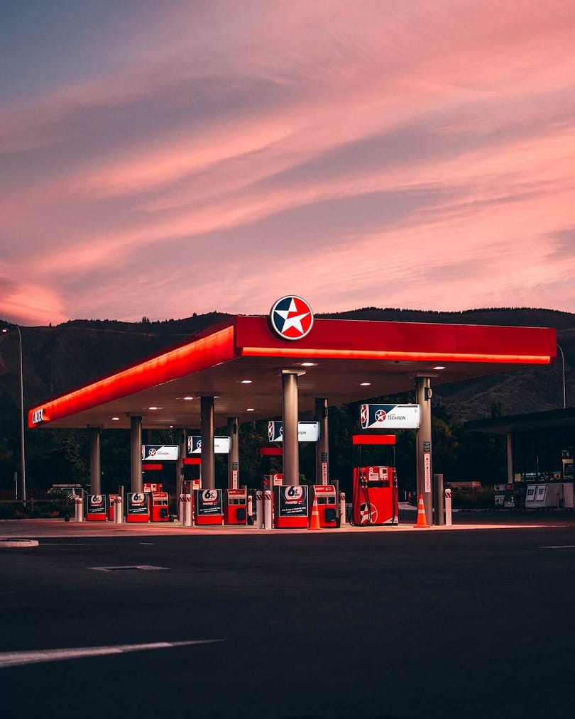 red caltex gas station during golden hour