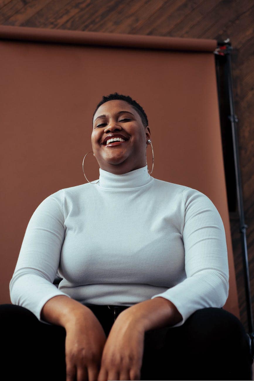 woman wearing white turtleneck sweater