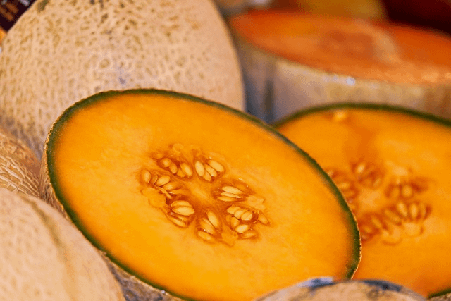 Nigerian kitchen melon, sliced, ripe Nigerian kitchen