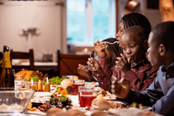 Family enjoying Ogbono soup