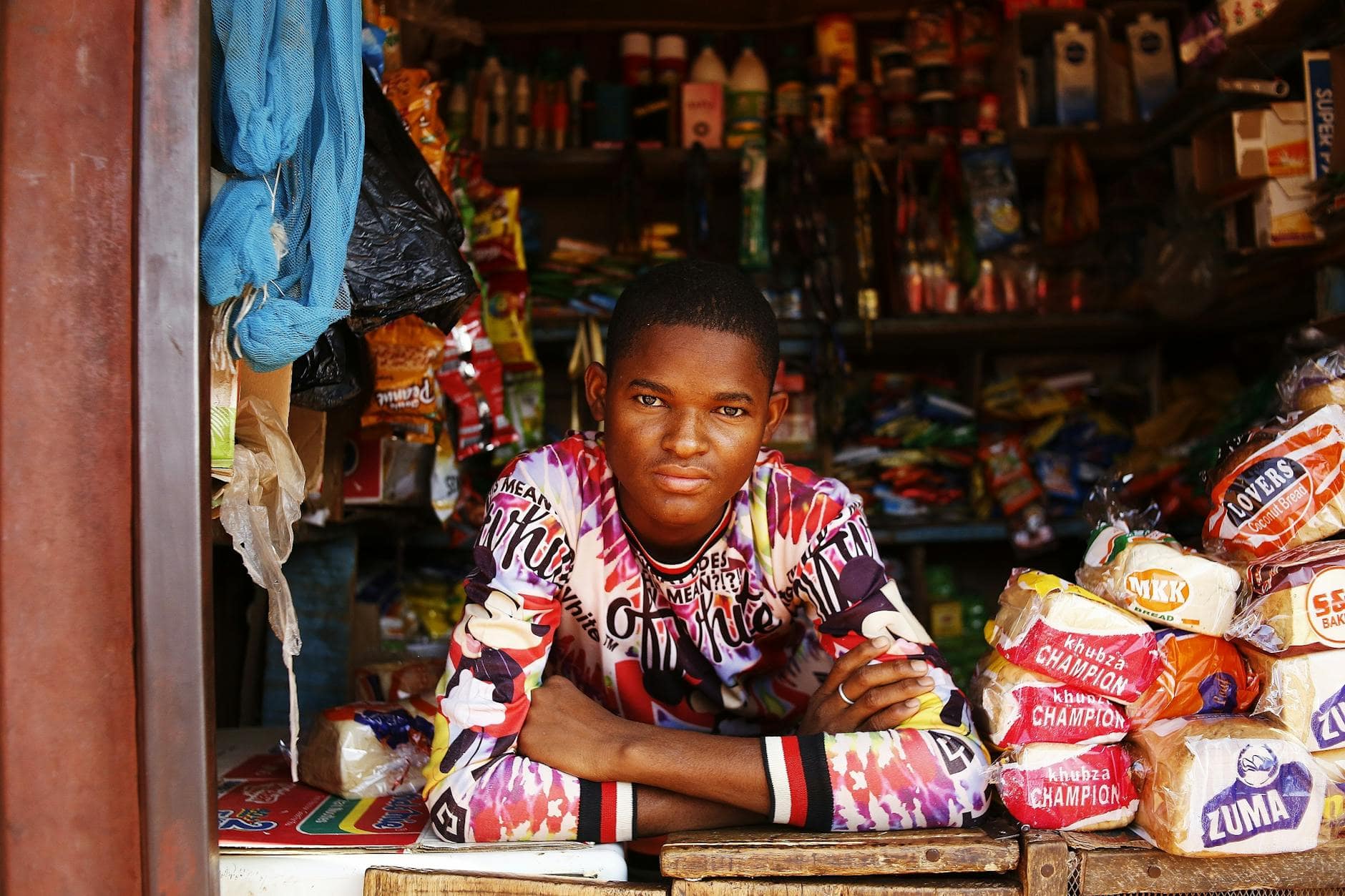 young shopkeeper in Maraba abuja market