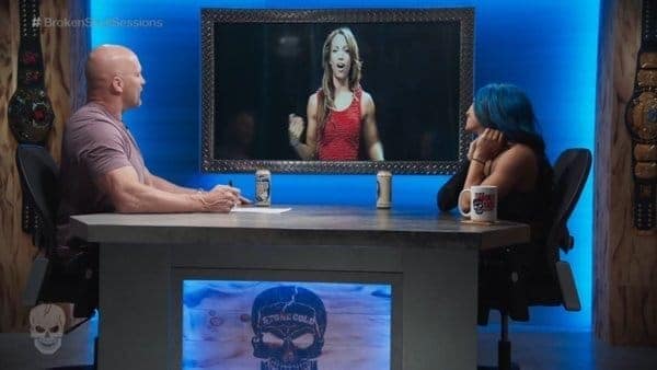 Sasha Banks talks with 'Stone Cold' Steve Austin.